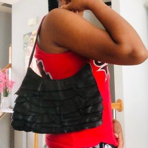 Black real leather shoulder bag.